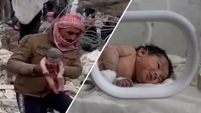 Pasgeboren baby met navelstreng uit puin gehaald in Syrië